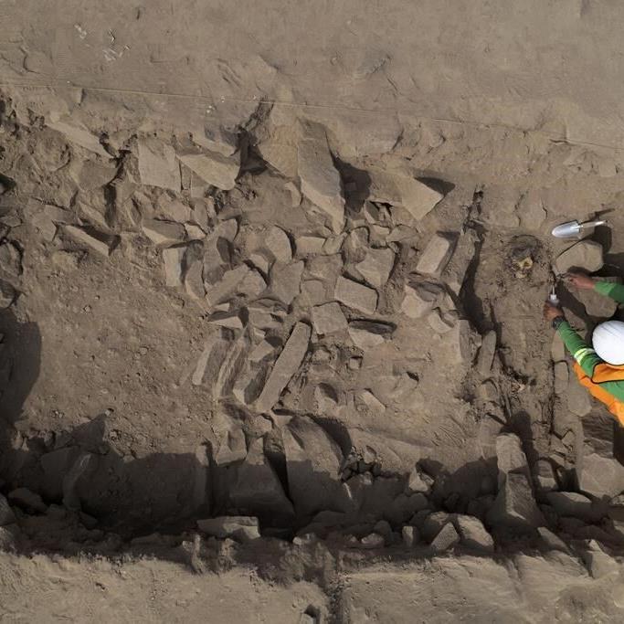 Archeologists find mummy surrounded by coca leaves on hilltop in Peru's capital